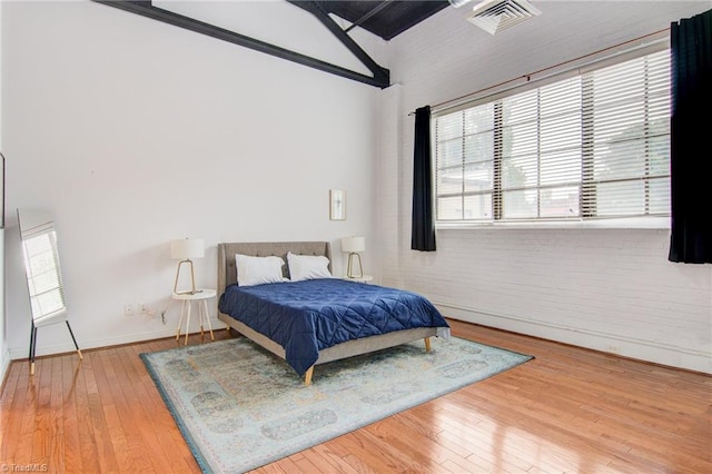 bedroom featuring wood-type flooring