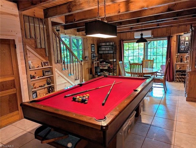 rec room featuring a healthy amount of sunlight, tile patterned flooring, wood walls, and billiards