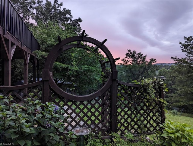 view of gate at dusk