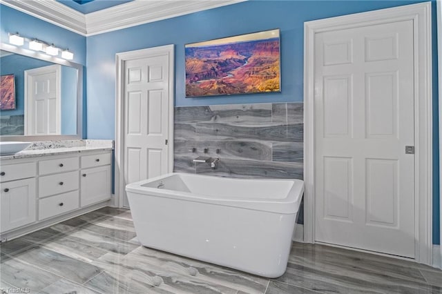 265 Phillip Henderson Rd, Rutherfordton, NC 28139 - bathroom with vanity, a freestanding bath, crown molding, and tile walls