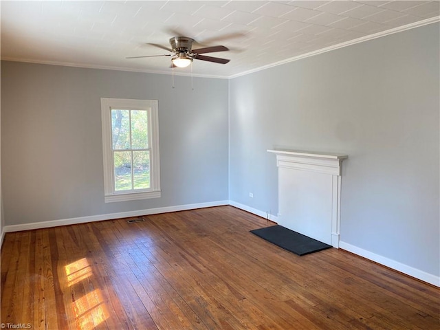 unfurnished living room featuring hardwood / wood-style flooring, baseboards, ornamental molding, and a ceiling fan