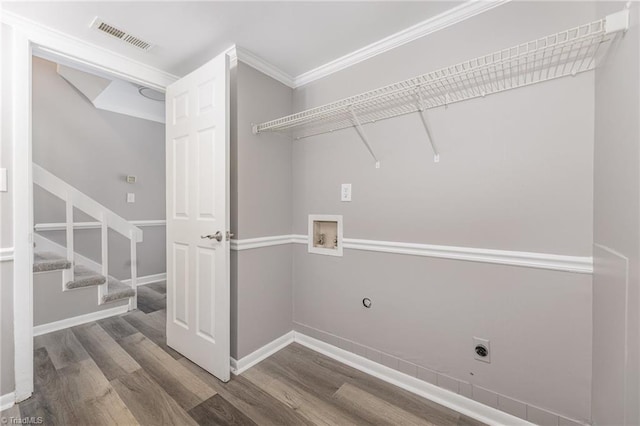 laundry room with washer hookup, visible vents, hookup for an electric dryer, wood finished floors, and laundry area