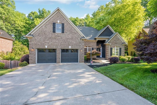 4455 Greystone Place Ct, Winston-Salem, NC 27106 - traditional home with concrete driveway, an attached garage, and brick siding