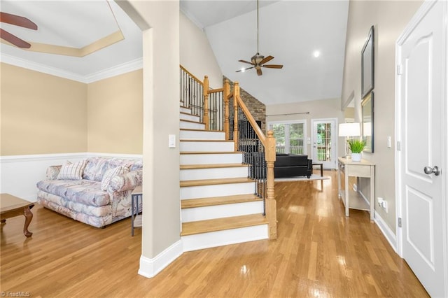 4455 Greystone Place Ct, Winston-Salem, NC 27106 - stairway featuring a ceiling fan, wood finished floors, high vaulted ceiling, and ornamental molding