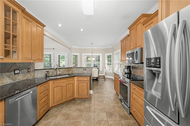 4455 Greystone Place Ct, Winston-Salem, NC 27106 - kitchen featuring appliances with stainless steel finishes, plenty of natural light, backsplash, glass insert cabinets, and ornamental molding