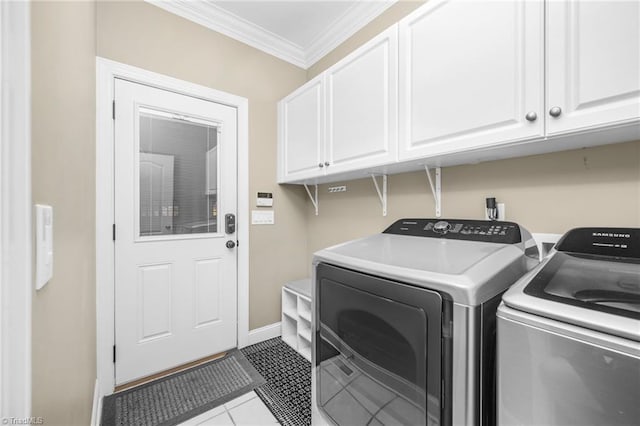 4455 Greystone Place Ct, Winston-Salem, NC 27106 - laundry room with washer and dryer, cabinet space, crown molding, and tile patterned flooring