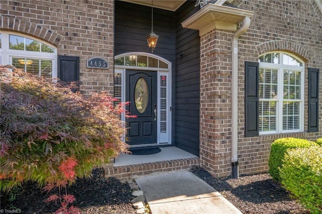 4455 Greystone Place Ct, Winston-Salem, NC 27106 - view of exterior entry with brick siding