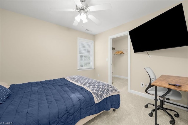 4455 Greystone Place Ct, Winston-Salem, NC 27106 - bedroom featuring carpet floors, a walk in closet, and a ceiling fan