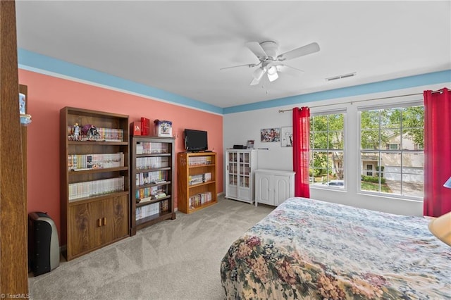 bedroom with carpet flooring and a ceiling fan