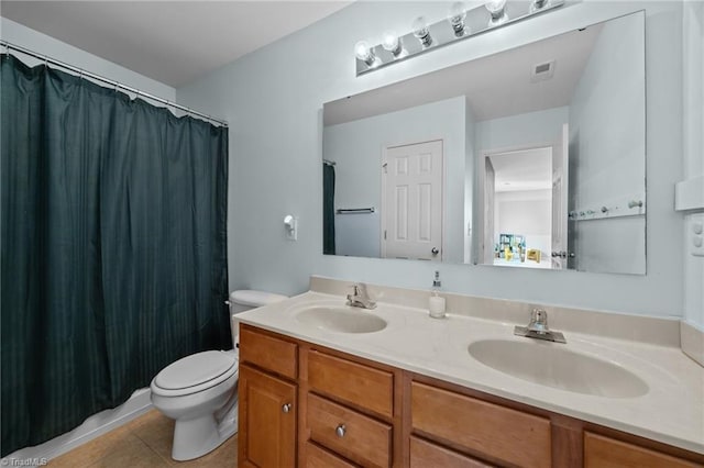 bathroom featuring toilet, tile patterned floors, double vanity, and a shower with shower curtain