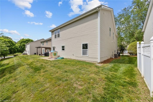 rear view of property featuring cooling unit