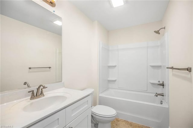 bathroom featuring vanity, toilet, and bathing tub / shower combination