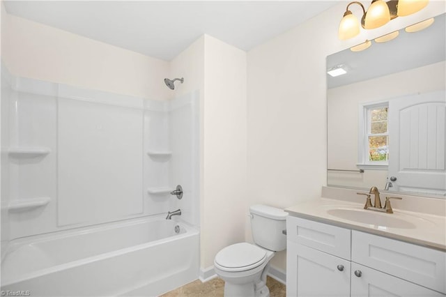 bathroom featuring vanity, shower / bathing tub combination, toilet, and baseboards