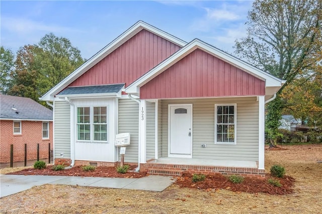 bungalow-style house with crawl space and a porch