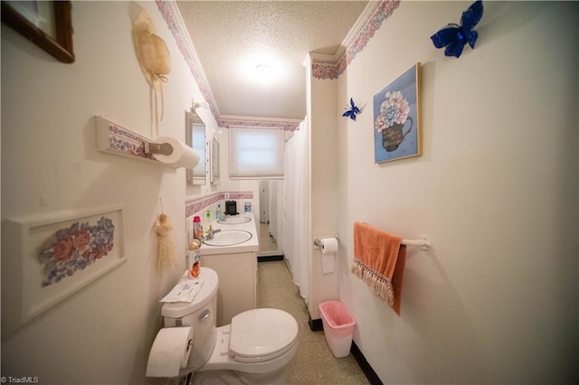 bathroom featuring sink, ornamental molding, a textured ceiling, and toilet