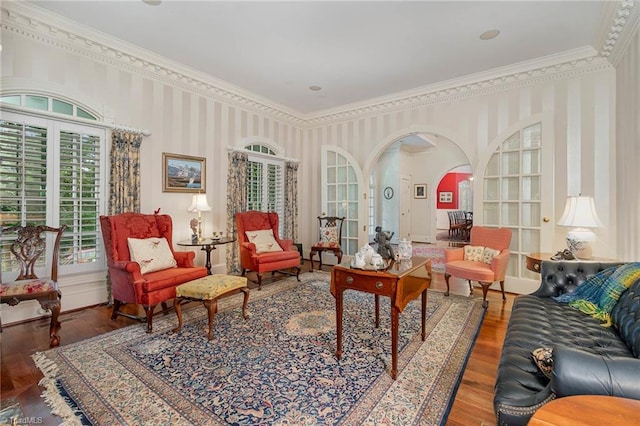 4432 Bent Tree Farm Rd, Winston-Salem, NC 27104 - living area with wallpapered walls, crown molding, hardwood / wood-style floors, and arched walkways