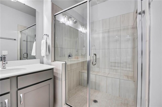 5166 Whaitley Ln, Greensboro, NC 27407 - bathroom with a stall shower and vanity