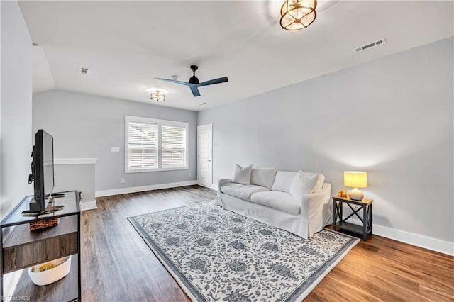 5166 Whaitley Ln, Greensboro, NC 27407 - living area with a ceiling fan, wood finished floors, and baseboards