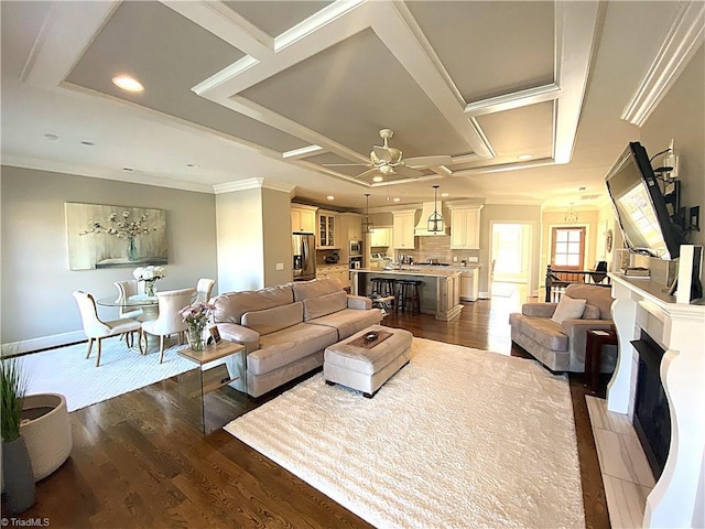 living room with coffered ceiling, dark wood finished floors, recessed lighting, ceiling fan, and crown molding