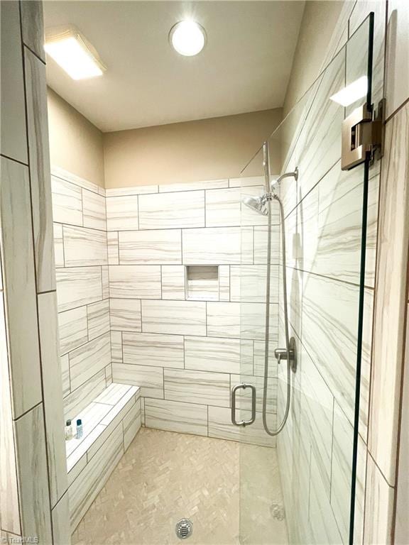 full bathroom with a shower stall