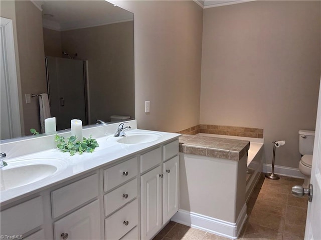 full bathroom with tile patterned floors, toilet, and a sink