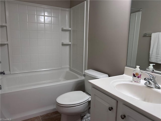 bathroom with vanity, toilet, and washtub / shower combination