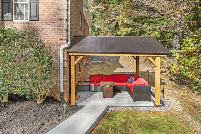 wooden terrace featuring an outdoor hangout area