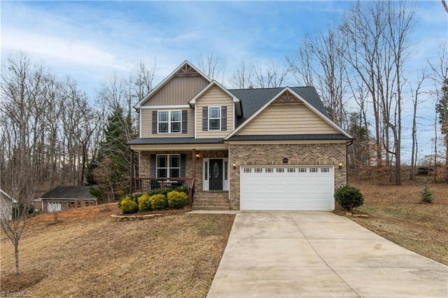 craftsman inspired home with a garage, a front lawn, and covered porch