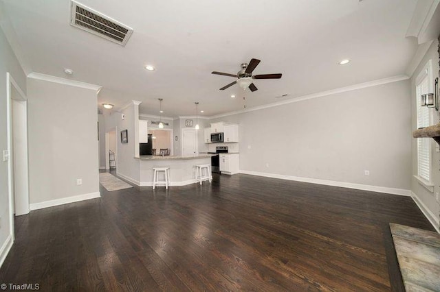 unfurnished living room featuring crown molding, dark hardwood / wood-style floors, and ceiling fan