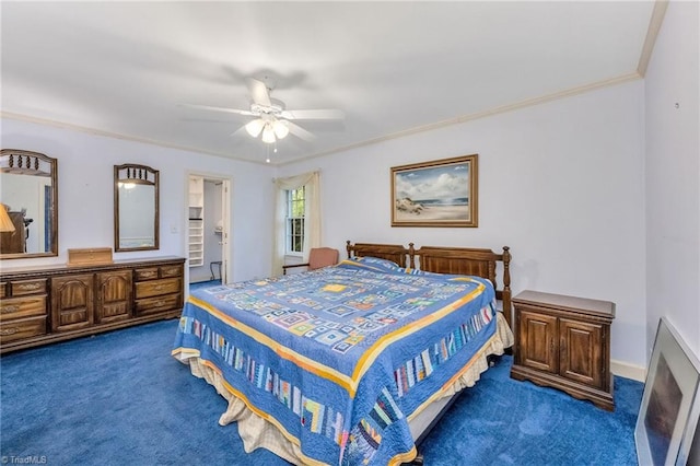 carpeted bedroom with ornamental molding and ceiling fan