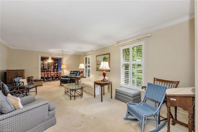carpeted living area featuring ornamental molding