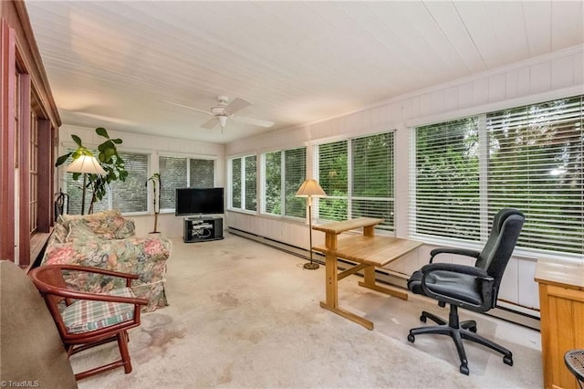 sunroom / solarium featuring wood ceiling and carpet flooring