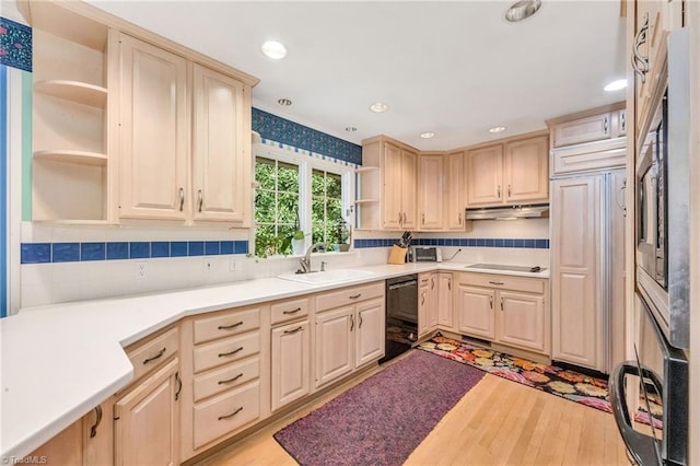 kitchen featuring open shelves, a sink, light brown cabinetry, and black appliances
