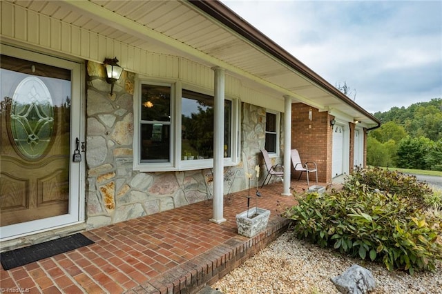 property entrance featuring covered porch