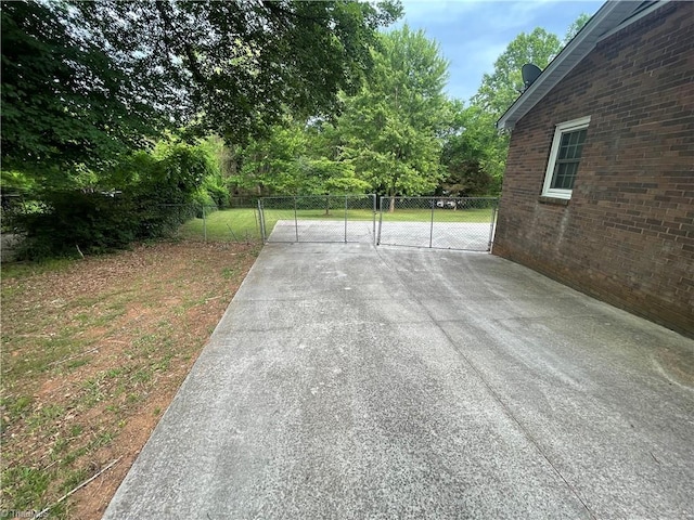 157 Peace Haven Rd N, Winston-Salem, NC 27104 - view of patio with a gate and fence