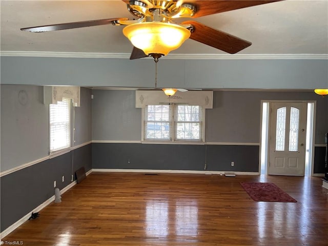 157 Peace Haven Rd N, Winston-Salem, NC 27104 - unfurnished room featuring a ceiling fan, plenty of natural light, crown molding, and wood finished floors