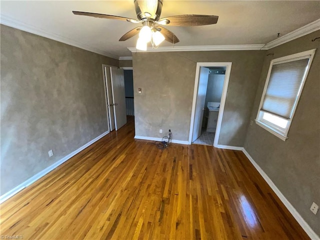 157 Peace Haven Rd N, Winston-Salem, NC 27104 - unfurnished bedroom featuring wood finished floors, baseboards, ornamental molding, ceiling fan, and ensuite bathroom