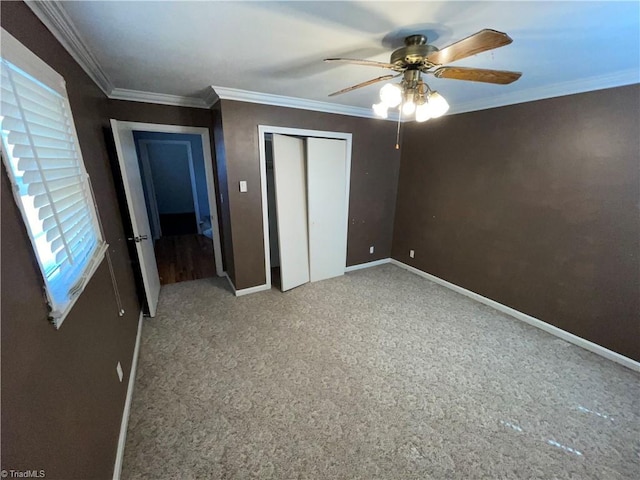 157 Peace Haven Rd N, Winston-Salem, NC 27104 - unfurnished bedroom featuring baseboards, ornamental molding, a closet, ceiling fan, and light colored carpet