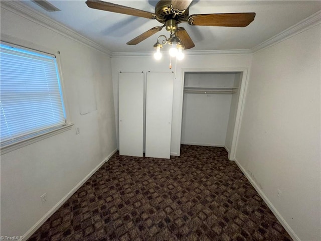 157 Peace Haven Rd N, Winston-Salem, NC 27104 - unfurnished bedroom featuring carpet flooring, a closet, crown molding, a ceiling fan, and baseboards