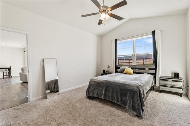 bedroom featuring lofted ceiling, carpet floors, and ceiling fan