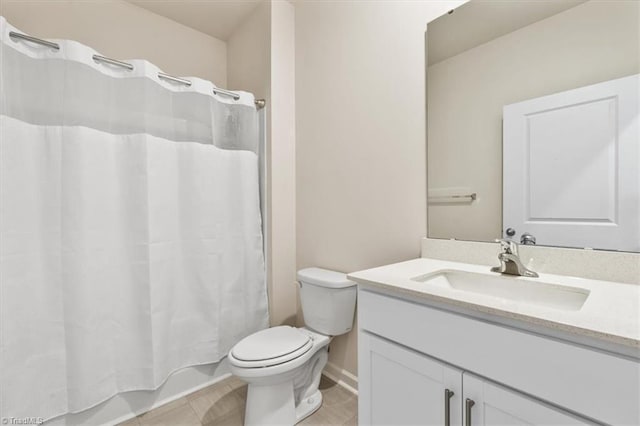 full bathroom featuring toilet, shower / tub combo, and vanity