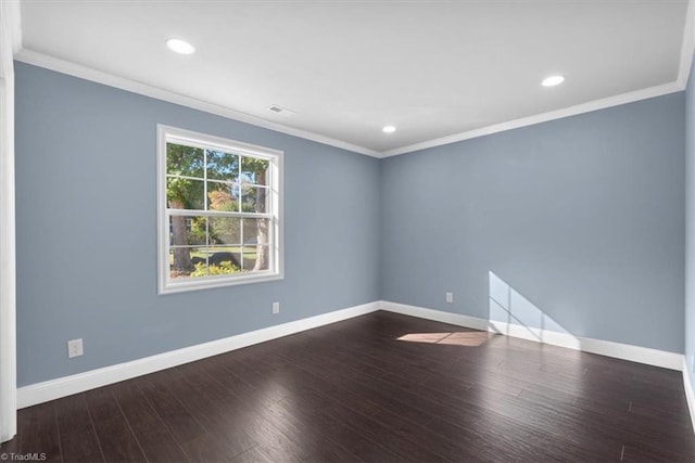 unfurnished room featuring crown molding and dark hardwood / wood-style floors