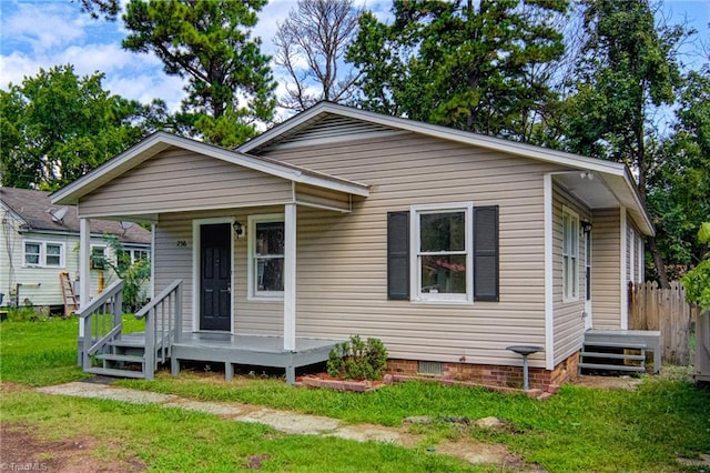 bungalow with a front yard