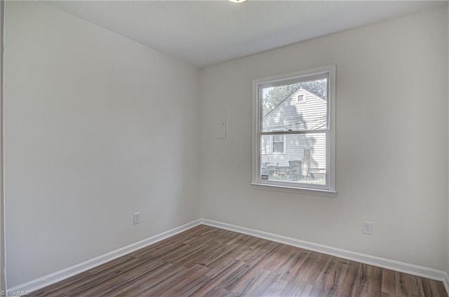 spare room featuring hardwood / wood-style flooring