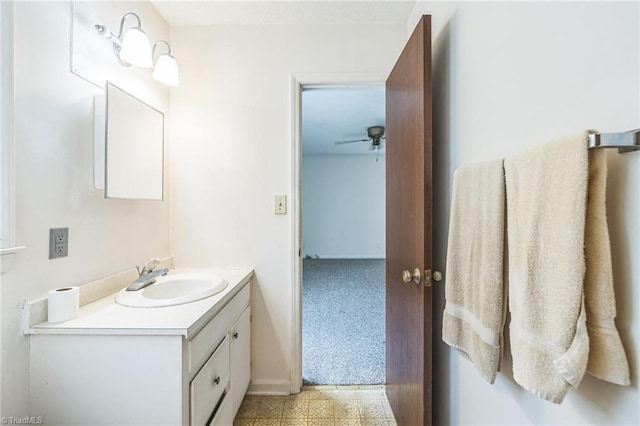 bathroom featuring vanity and ceiling fan