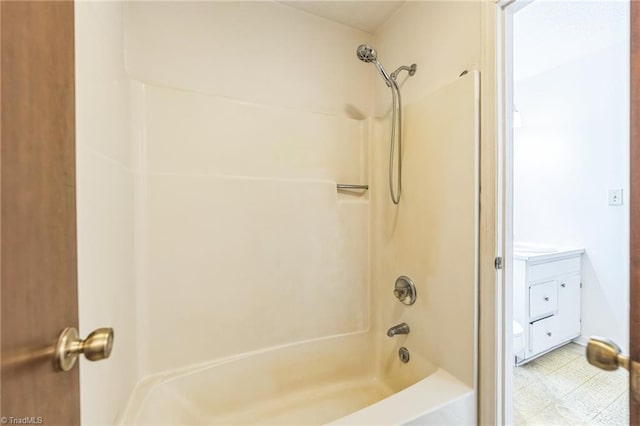 bathroom featuring vanity and tub / shower combination