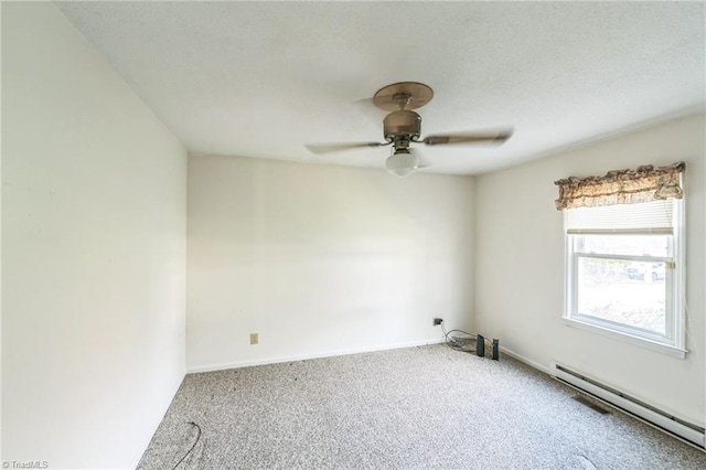 unfurnished room featuring ceiling fan, carpet flooring, and a baseboard radiator