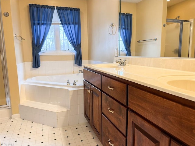 bathroom with shower with separate bathtub and vanity