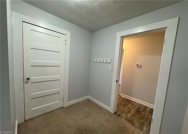 entryway with hardwood / wood-style flooring