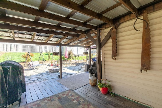 deck with fence and area for grilling